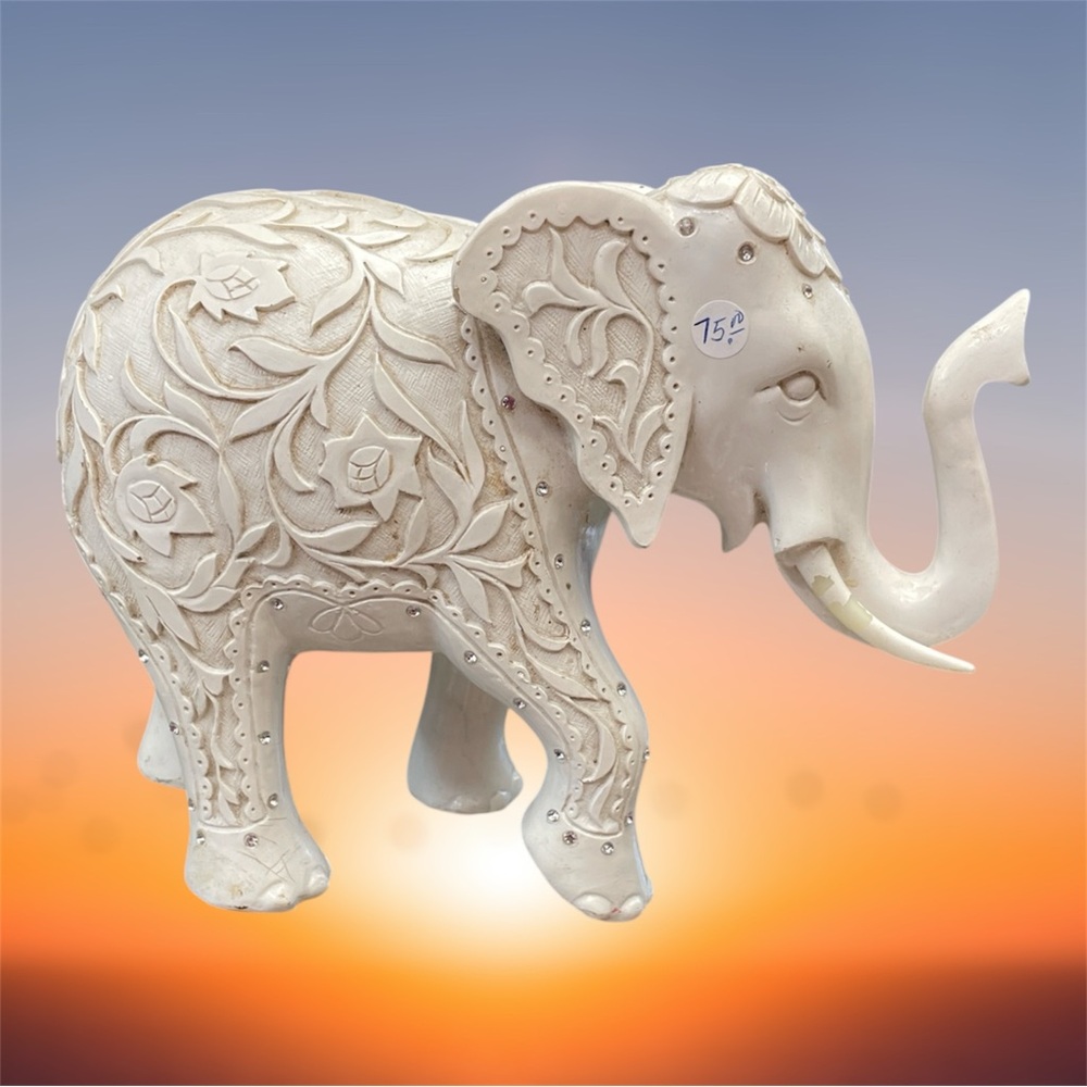 White Elephant Figurine with Intricate Design